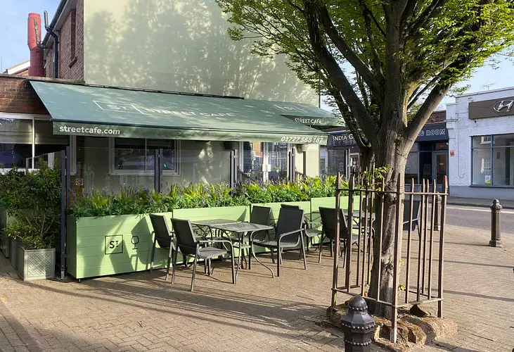 NEW OUTSIDE VIEW OF STREET CAFE IN ST ALBANS